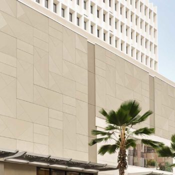 TAKTL's ultra-high-performance concrete panels on the Waikiki Business Plaza by MGA Architecture. Image © TAKTL